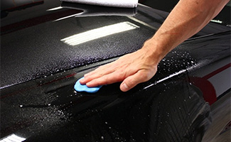 Auto detailing with Clay and Wax Treatment